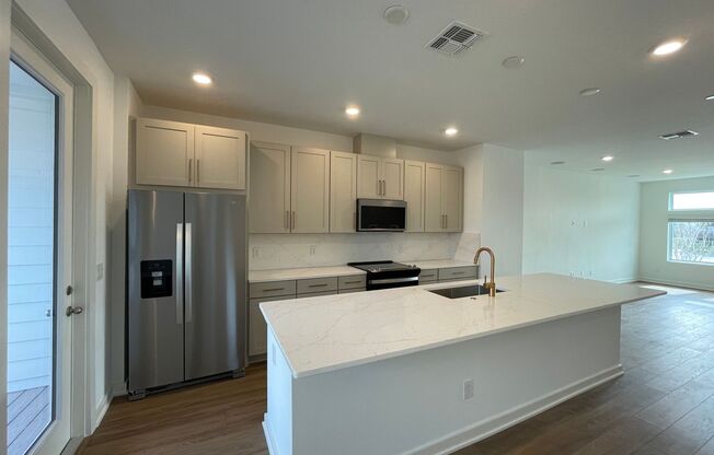3 Bedroom, 3.5 Bath Townhome with 2 Car Garage and Water Views!