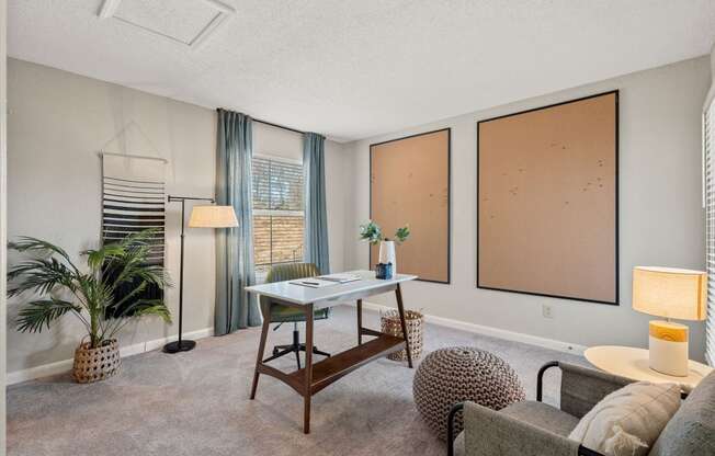 the preserve at ballantyne commons living room with windows and a desk