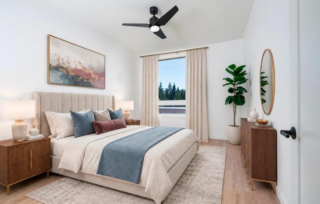 Comfortable bedrooms feature oversized windows, ceiling fans, and contemporary finishes designed to create a bright and relaxing retreat.