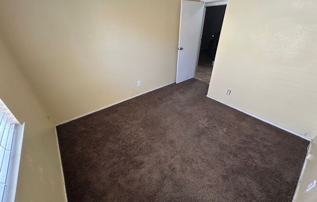 BEAUTIFULLY RENOVATED HOME WITH NEW PAINT, CARPET, AND LIGHT FIXTURES