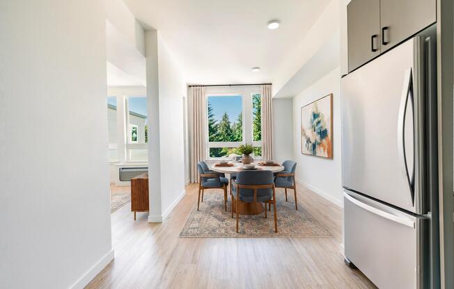 Thoughtfully designed dining spaces feature oversized windows, scenic views, and seamless connections to adjacent living areas for comfortable everyday dining and entertaining.