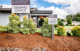 Sumner Apartments - The Retreat Apartments - Leasing Office Exterior and Community Mascot