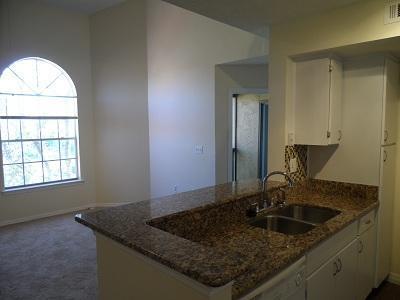 3 bedrooms 2 bath with balcony condo 1,247sqf of space with granite counter tops. Must see it! this unit is located in a gated community at Bella Vista Apartments just at walking distant from market places, restaurants, banks and more. Laundry room, pool,