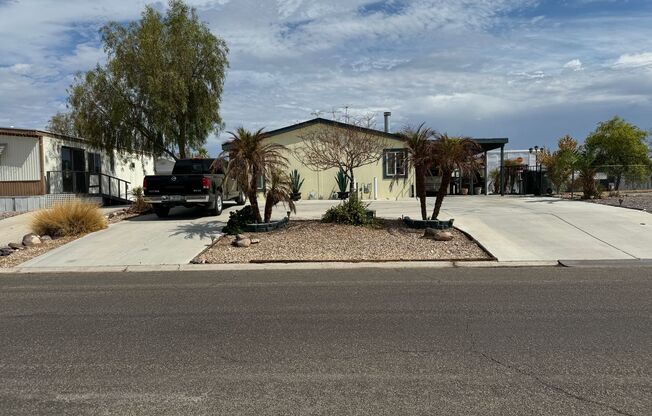 3Br Furnished Vacation Home with addl lot with RV Hookups Utilities Included