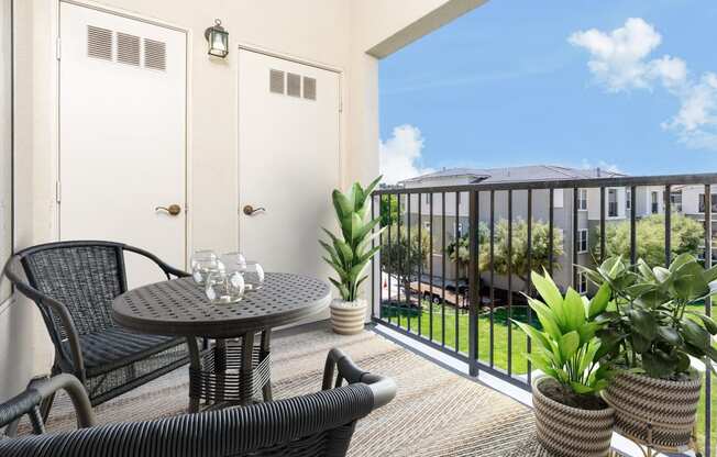 a patio with a table and chairs on a balcony