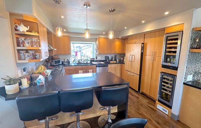 Stunning Hillside Home with Expansive Views and Modern Comforts