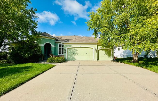 {9003} Wilshire Farms Reverse 1.5 Story Home + Walkout Basement + Three Car Garage + Fenced Yard