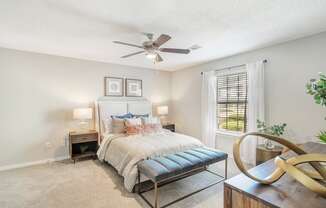 a bedroom with a bed and a ceiling fan at Reserve of Jackson Apartment Homes, Mississippi, 39211