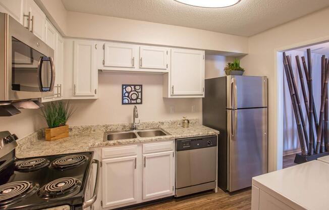 Another picture of the fully-equipped kitchen in The Juniper at Ashwood Cove