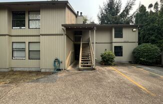 Beautiful Upper-Level Condo in the Heart of Multnomah Village with Private Covered Balcony and In-Unit Washer & Dryer