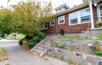 Bright One Bedroom Unit in Fourplex with Vintage Appeal, Original Hardwoods and Garage Available!