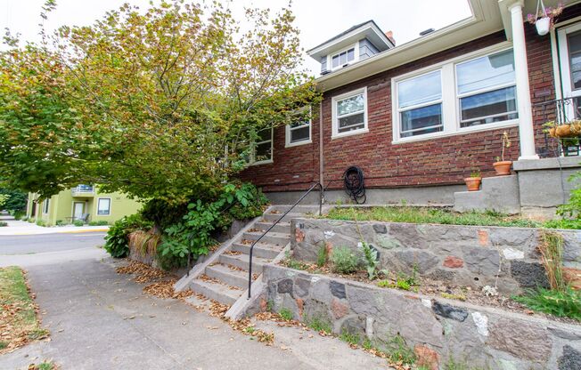 Bright One Bedroom Unit in Fourplex with Vintage Appeal, Original Hardwoods and Garage Available!