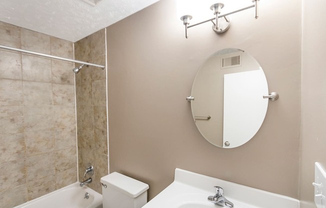 This is a photo of the primary bathroom of an upgraded 950 square foot, 2 bedroom apartment at Deer Hill Apartments in Cincinnati, OH.