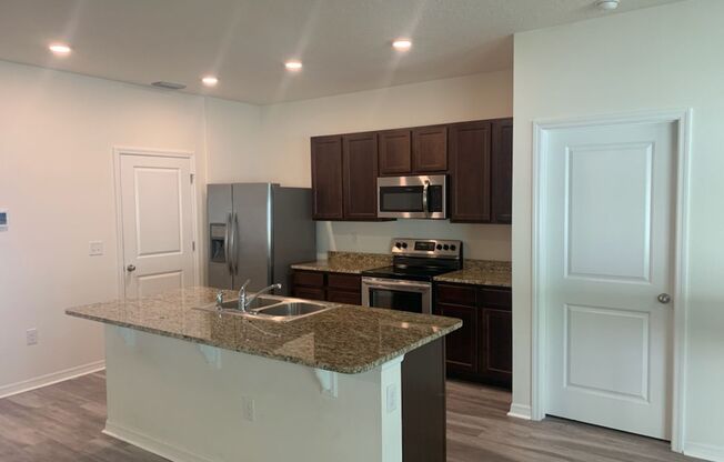 Beautiful Home Located In The New Chestnut Village Neighborhood On SW Archer Road