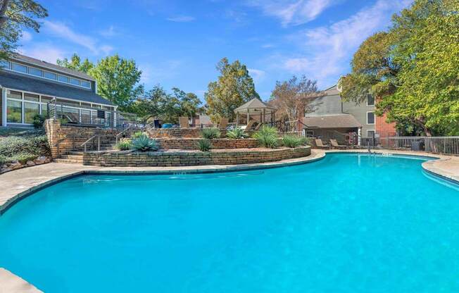 Large swimming pool in a backyard at Great Hills, Austin, TX 78759