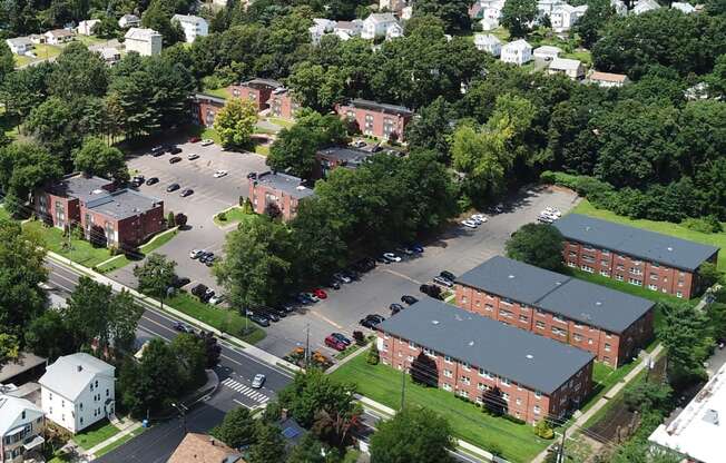 an aerial view of a parking lot in a city at Springwood Gardens, New Britain, CT, 06053