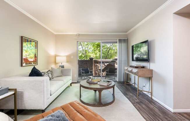 a living room with a couch and a table