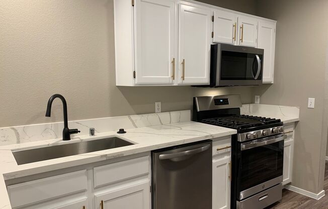 STUNNING REMODELED TOWNHOME — YOUR NEXT HOME JUST FOUND YOU!