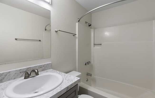 Bathroom with Sink and Shower with Tub at Swiss Gables Apartment Homes, WA 98032