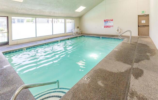 Indoor Pool Area at Heron Pointe Apartments & Townhomes, California, 93711