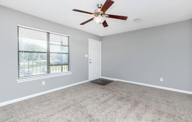 a small airplane hanging from the ceiling in a room