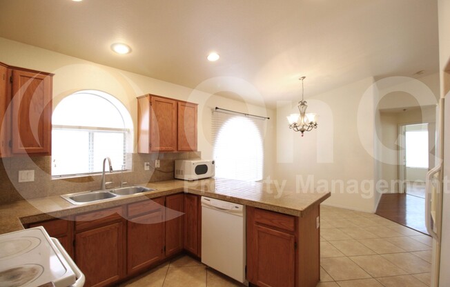 1140 S CHOLLA ST