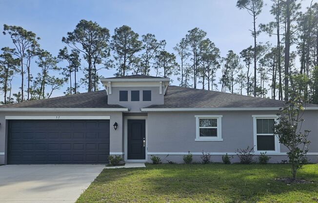 **$1,000 OFF THE 1ST MONTH RENT! Beautiful 4/2 HOME IN PALM COAST