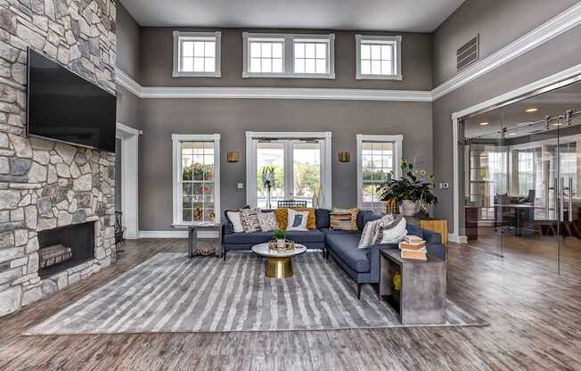 clubhouse with sitting area and fireplace