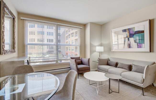 living room with large windows overlooking outside