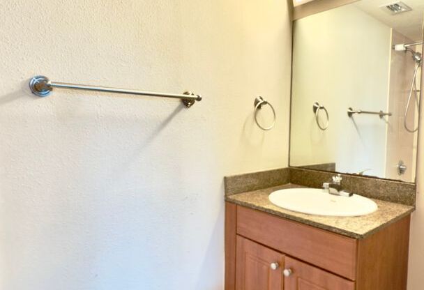 Beachside One Bedroom Condo with Parking and In Unit Laundry