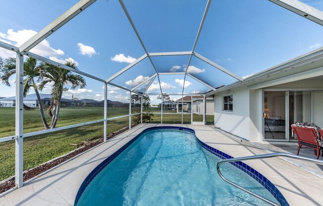 TURNKEY FURNISHED- HEATED SWIMMING POOL- 3 BEDROOMS, 2 BATH, 2 CAR GARAGE