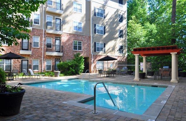 Swimming Pool And Sundeck at The Orleans of Decatur, Decatur, Georgia