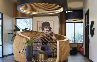 the lobby or reception area of a hotel with a wooden reception desk