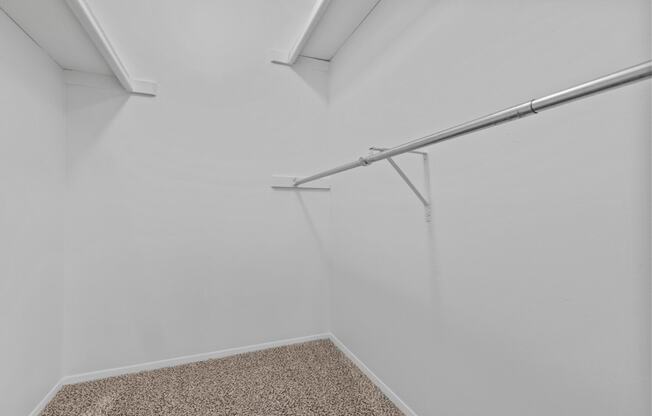 an empty room with white walls and a closet in the corner at Edge At Farmington Hills - Farmington Hills, MI, Farmington Hills, Michigan