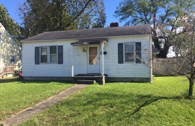 Bungalow with fully fenced back  yard    250520