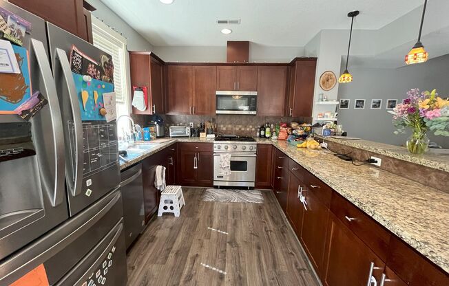 Live Smart in This Sleek & Spacious 3BR Townhome with Great Flow