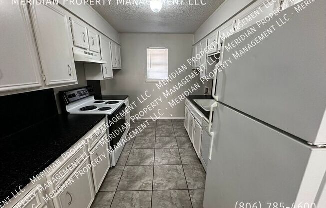 7303 Ave X