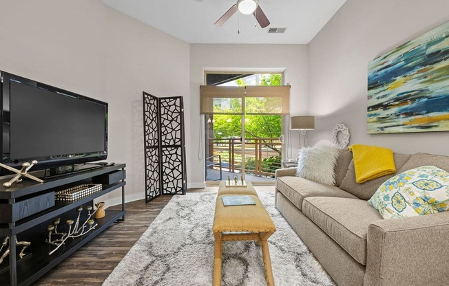 a living room with a couch and a television