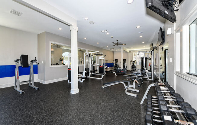 State of the Art Fitness Center featuring Wellbeats™ with Cardio and Weight Training and Flat Screen TVs at Alden Place at South Square Apartments, Durham, NC 27707