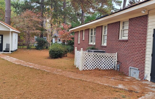 3 Bedroom 1 1/2 Bath Ranch style brick home with attached carport.