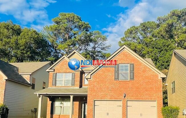 Brick front 2-story house in the DISCOVERY cluster in Lawrenceville