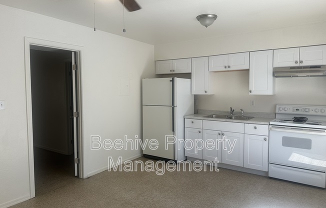 1102 E POLK ST