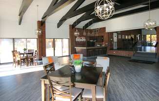 clubhouse room with chairs and a table at Lansing Riverwood, LLC, Lansing, 60438