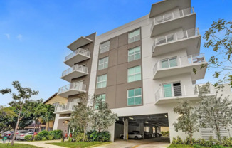 1BR/1BA Hollywood Condo with Den, Wraparound Balcony & Garage Parking — $2,900/mo
