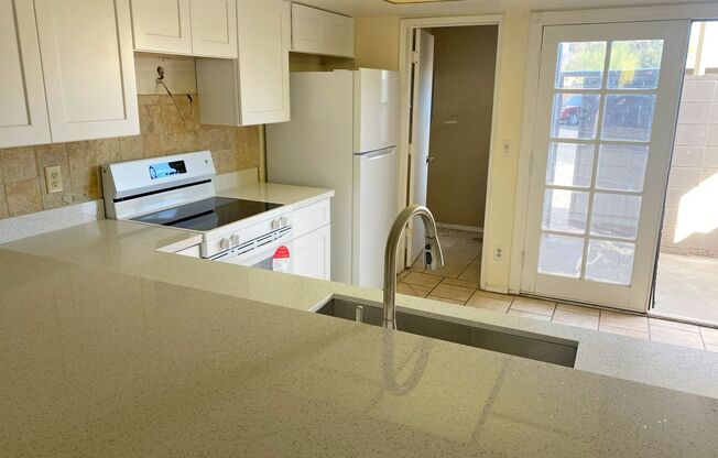 $500 off 2nd Months Rent for this 3 Bedroom 2.5 Townhouse with Brand New Kitchen, Paint and Flooring!