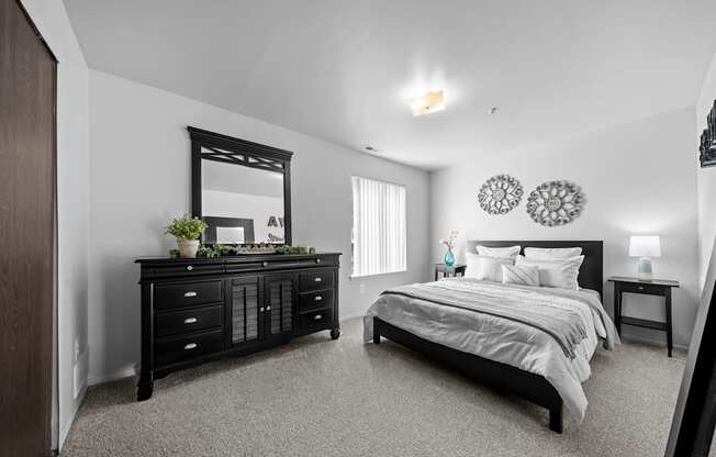 Big bedroom with natural lighting at Westwood Village Apartments in Westland, MI