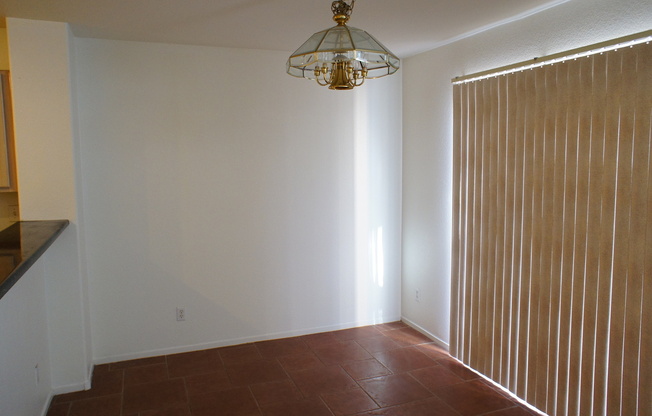 THIS IS A CHARMING TWO-STORY NORTH LAS VEGAS HOME WITH 2 BEDROOMS, 2.5 BATHS AND A TWO-CAR ATTACHED GARAGE. FEATURING TILE AND CARPET FLOORING, NEUTRAL PAINT, AND BLINDS THROUGHOUT, THE MAIN LEVEL OFFERS AN OPEN LIVING AND DINING AREA THAT FLOWS INTO A KI