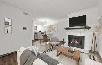 A living room with a fireplace and a couch.