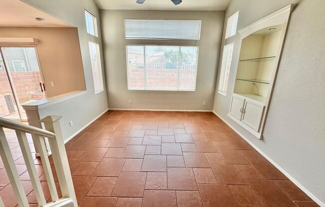 THIS IS A CHARMING TWO-STORY NORTH LAS VEGAS HOME WITH 2 BEDROOMS, 2.5 BATHS AND A TWO-CAR ATTACHED GARAGE. FEATURING TILE AND CARPET FLOORING, NEUTRAL PAINT, AND BLINDS THROUGHOUT, THE MAIN LEVEL OFFERS AN OPEN LIVING AND DINING AREA THAT FLOWS INTO A KI