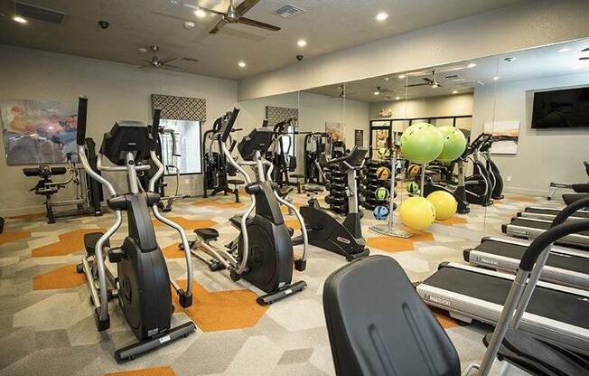 View of fitness center with equipment